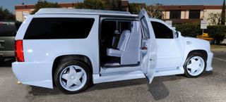 Illustration for article titled Christian Audigier Creates Snorkel-Nosed Custom Cadillac Escalade